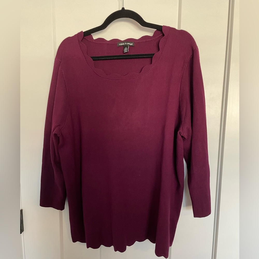 Beautiful scalloped neck and waist sweater.